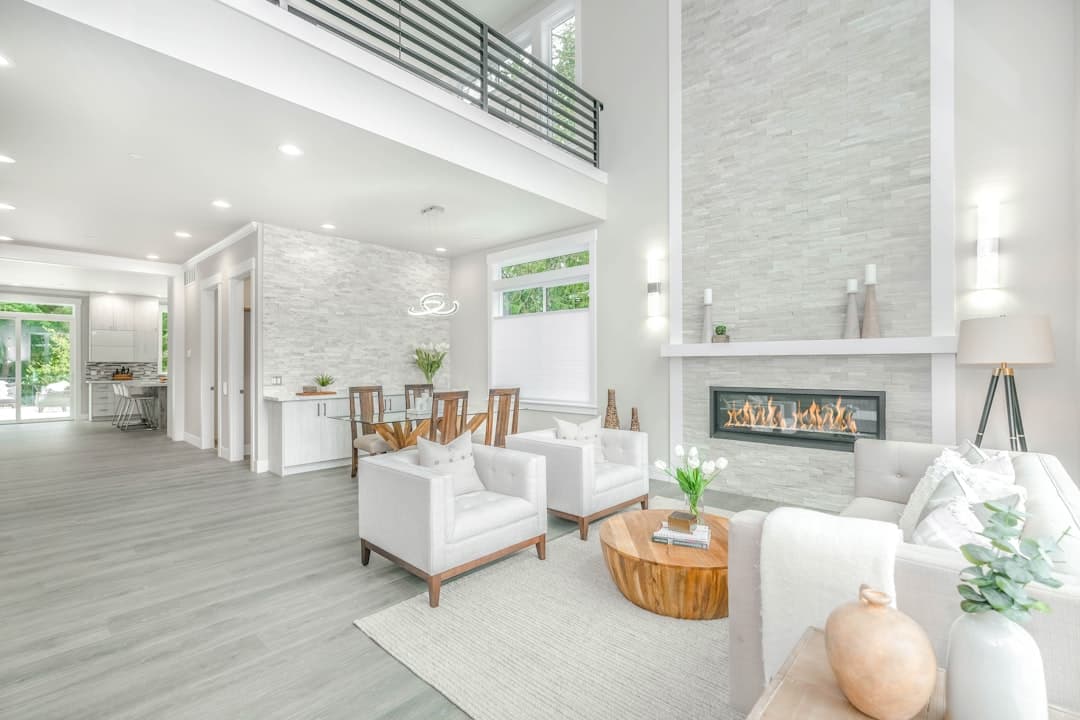 Modern new construction living room with flawless wall finish and warm tones