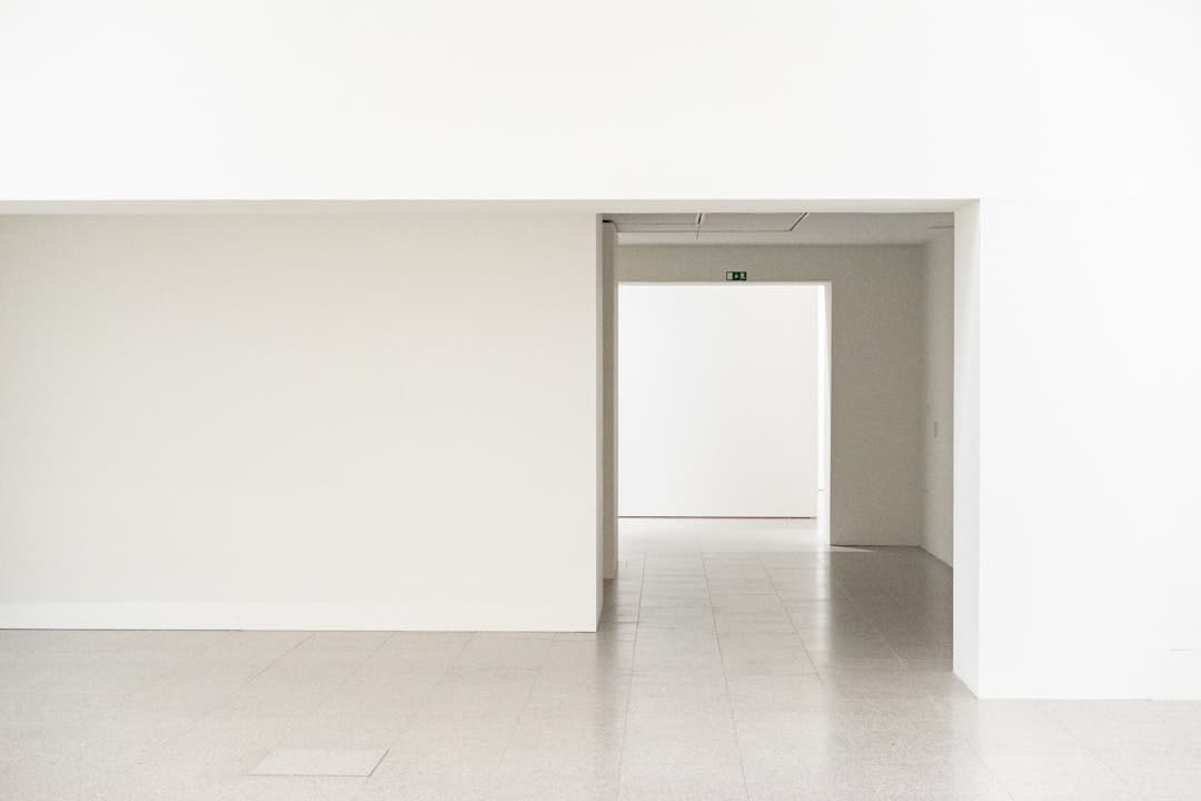 Smooth flawless white walls and doorway showing expert plaster repair